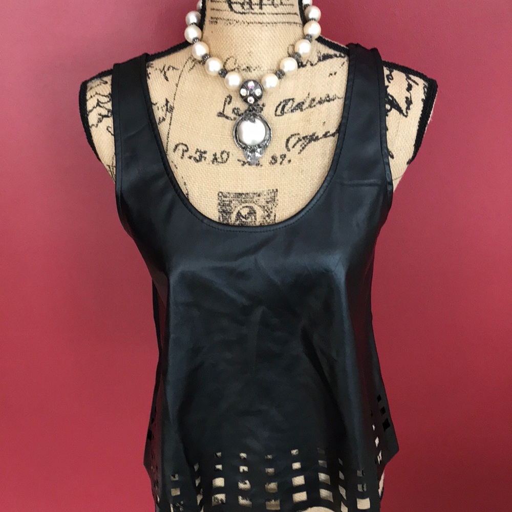Last Kiss black scoop neck look of leather top with peek a boo detailing on hem
